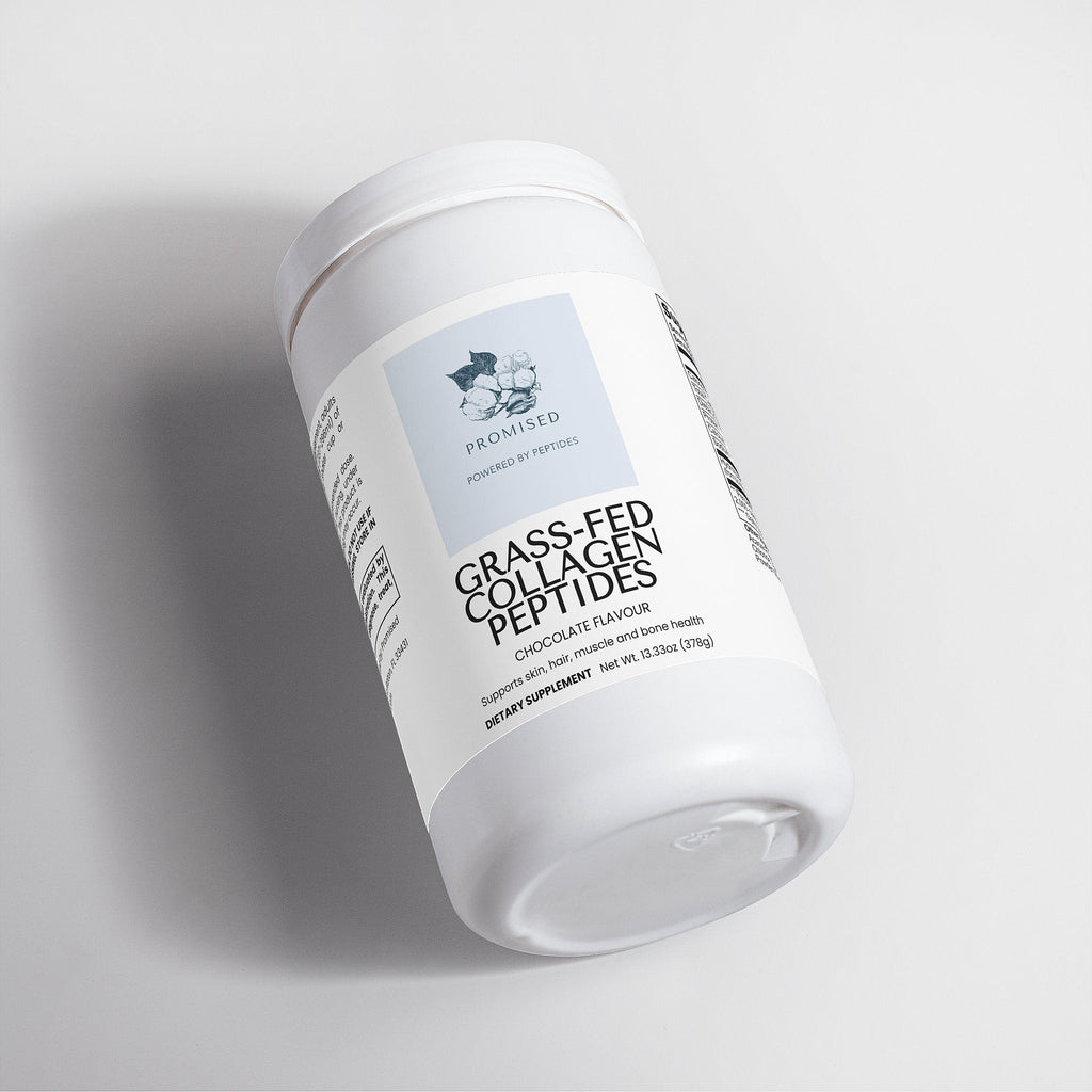 Promised Grass-Fed Chocolate Collagen Peptides powder supplement in a white plastic jar on a light background.