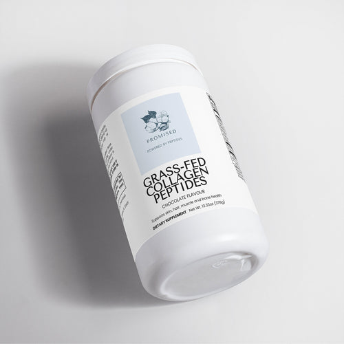 Promised Grass-Fed Chocolate Collagen Peptides powder supplement in a white plastic jar on a light background.