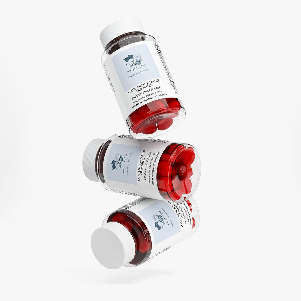 Promised Hair, Skin & Nails Gummies in three stacked bottles with red passion fruit flavored supplements